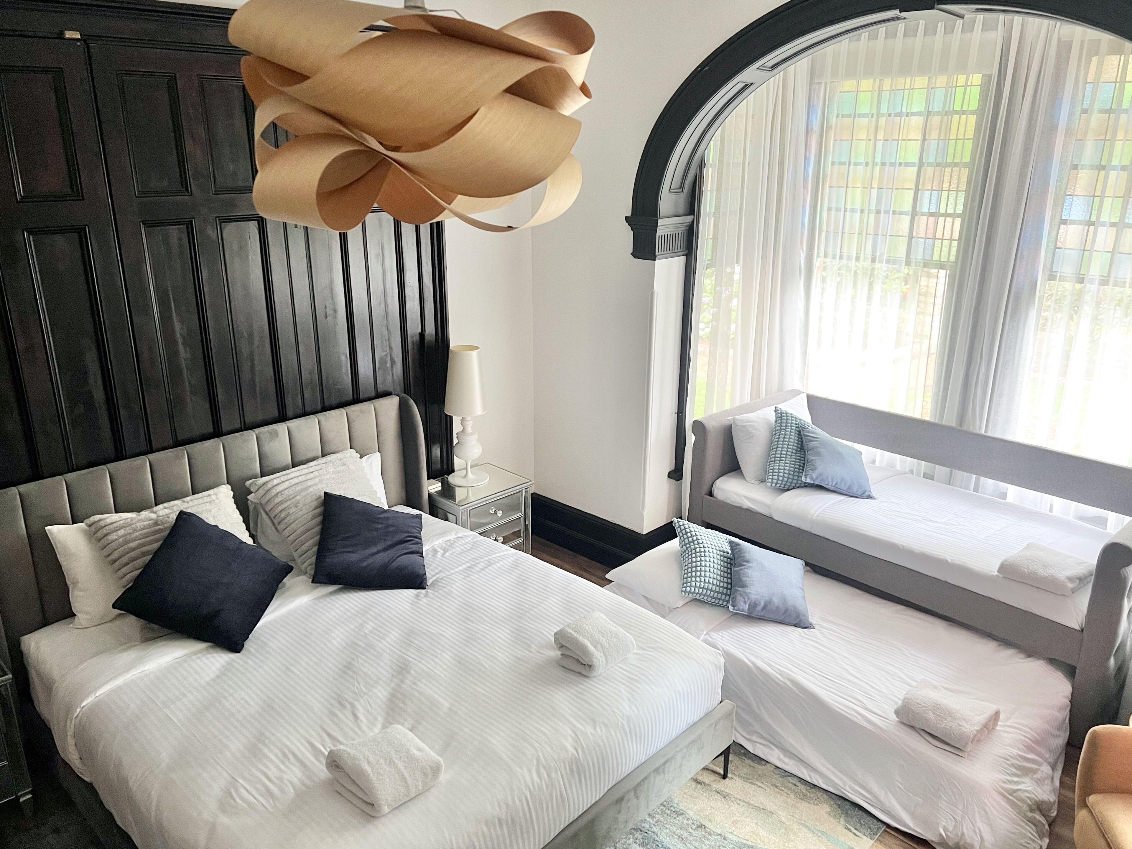 heritage family room shared bathroom | 1 bedroom, desk, laptop workspace, blackout curtains