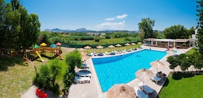 Outdoor pool, open 10:00 AM to 6:00 PM, pool umbrellas, pool loungers