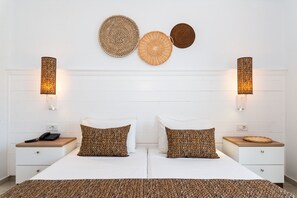 Een minibar, een kluis op de kamer, verduisterende gordijnen, beddengoed