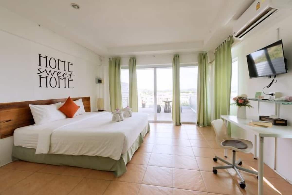 Premium bedding, desk, laptop workspace, free WiFi