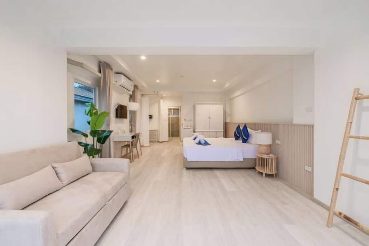 Premium bedding, desk, laptop workspace, free WiFi