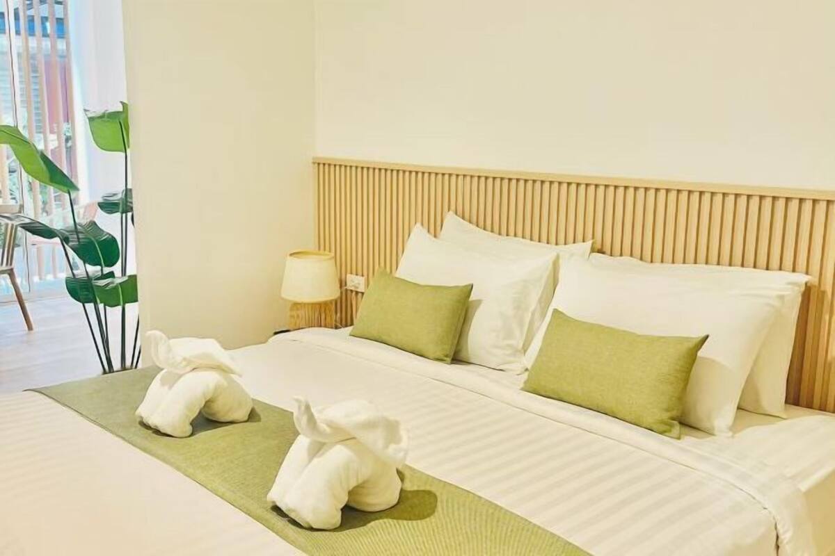 Premium bedding, desk, laptop workspace, free WiFi