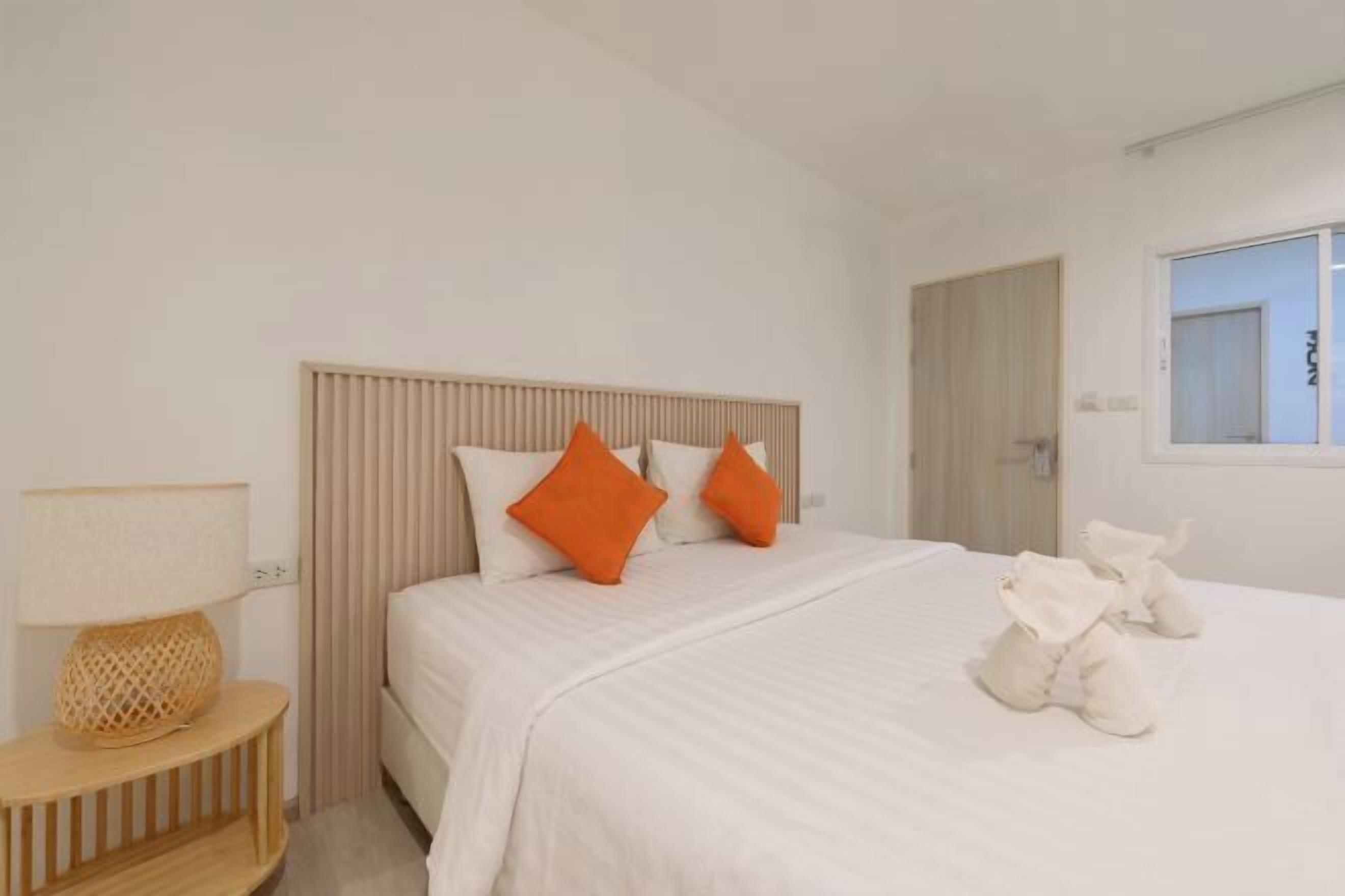 Premium bedding, desk, laptop workspace, free WiFi