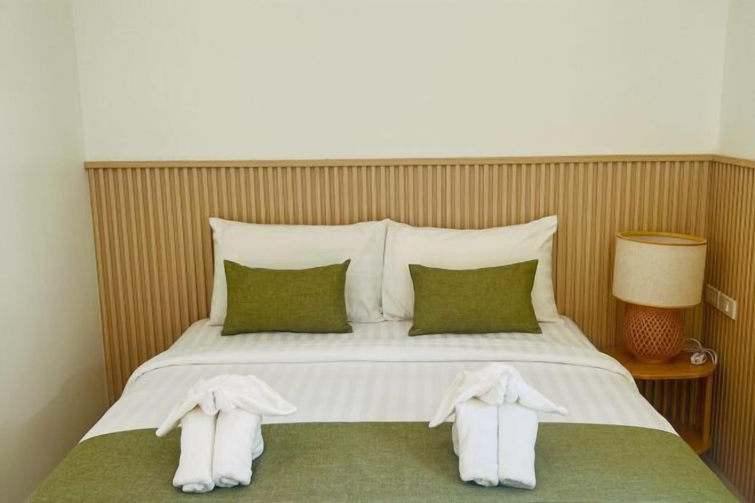 Premium bedding, desk, laptop workspace, free WiFi