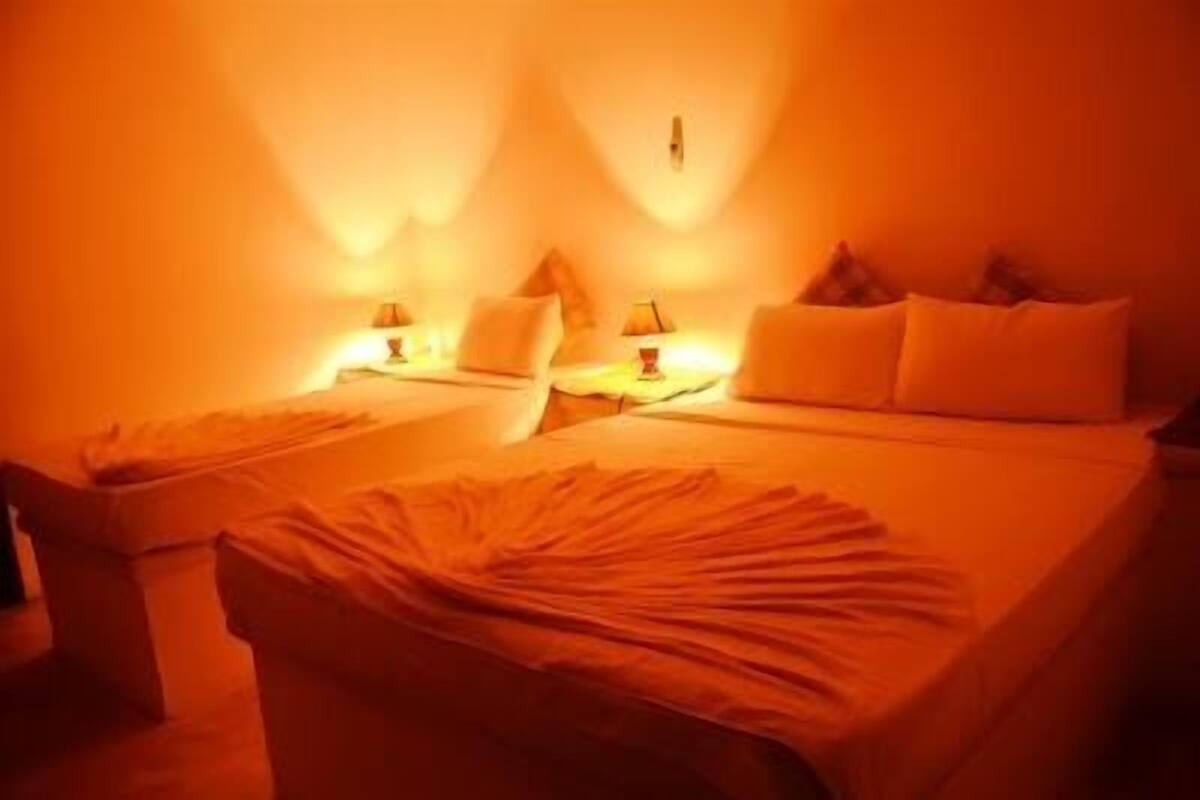 Deluxe Quadruple Room, 1 Bedroom, Pool Access, Garden View | 1 bedroom, individually furnished, iron/ironing board
