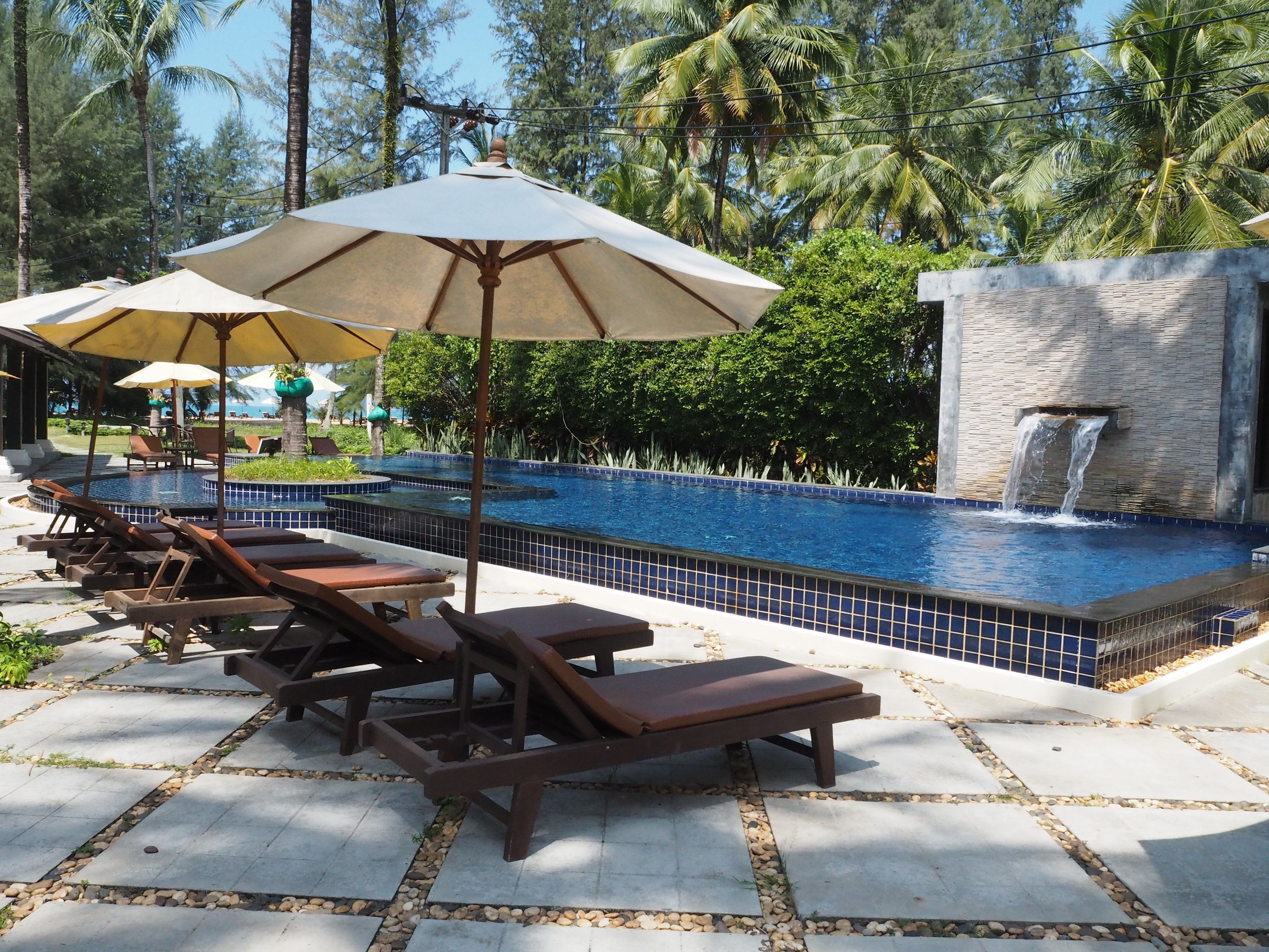 outdoor pool, pool umbrellas, pool loungers