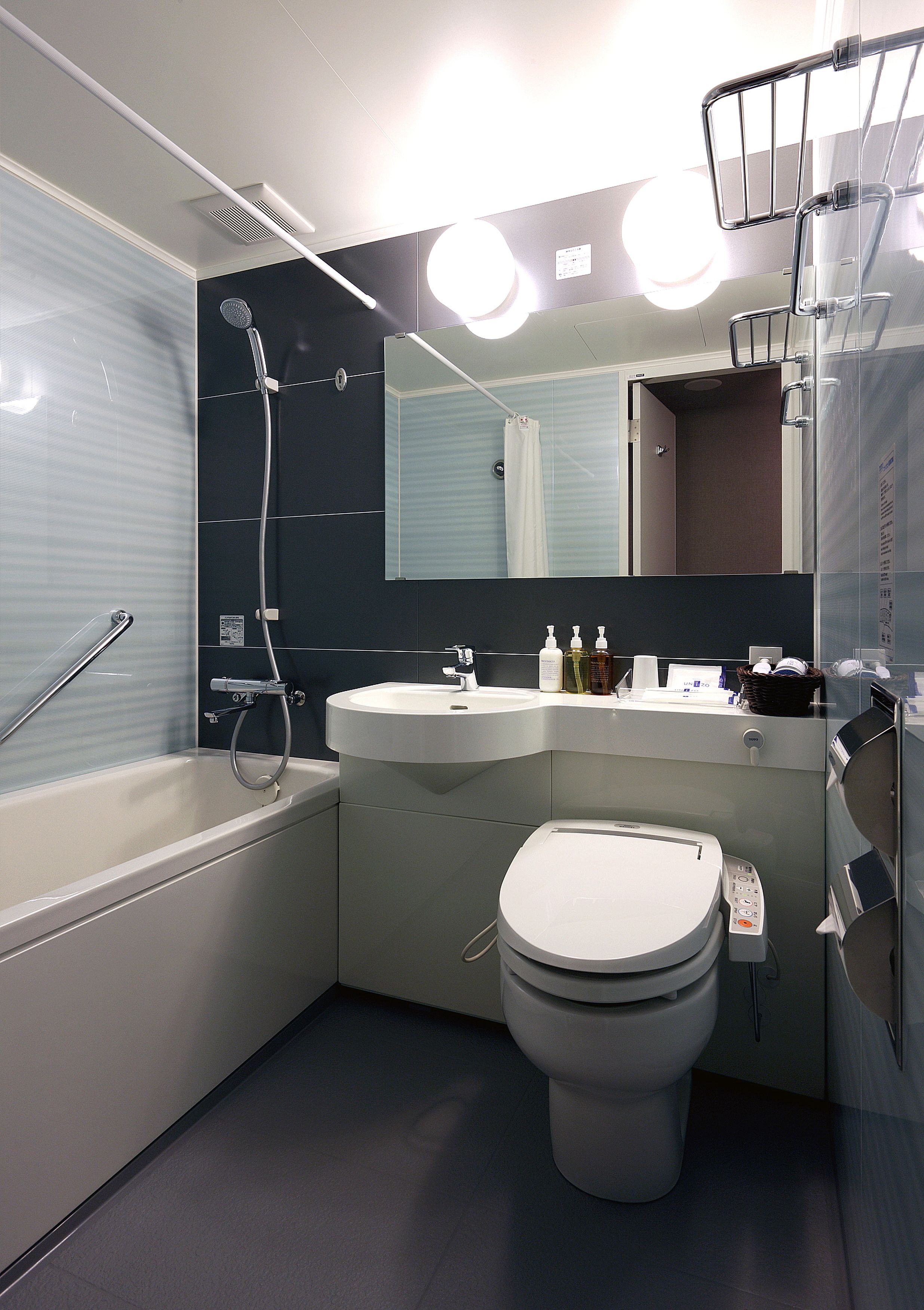 combined shower/bathtub, free toiletries, hair dryer, dressing gowns