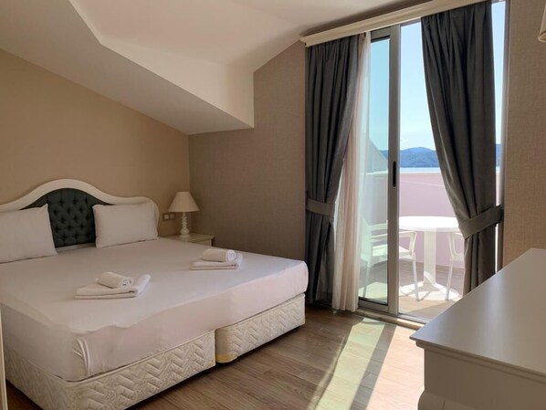 Economy 1 Yatak Odasi | 1 bedroom, in-room safe, desk, laptop workspace