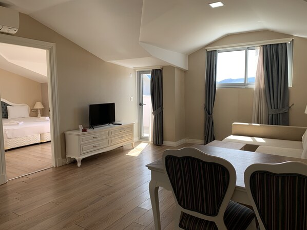 Economy 1 Yatak Odasi | 1 makuuhuone, tallelokero huoneessa, työpöytä