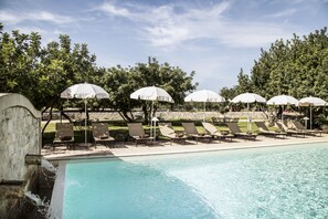 Outdoor pool, pool umbrellas, pool loungers