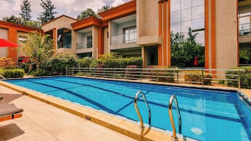Outdoor pool, open 9:00 AM to 6:00 PM, pool umbrellas, sun loungers