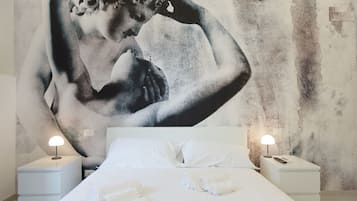 Frette Italian sheets, pillow-top beds, in-room safe