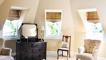 Deluxe Double Room | Living area | Flat-screen TV