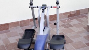 An exercise machine with a digital display, two foot pedals, and a handlebar. - Kathmandu Homestay (Kathmandu)