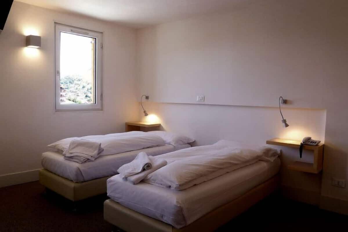 Down duvets, in-room safe, desk, free WiFi