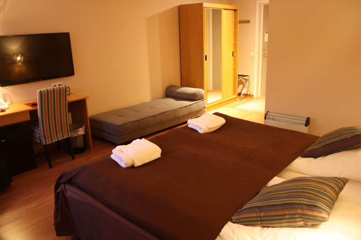 desk, blackout curtains, iron/ironing board, free wifi