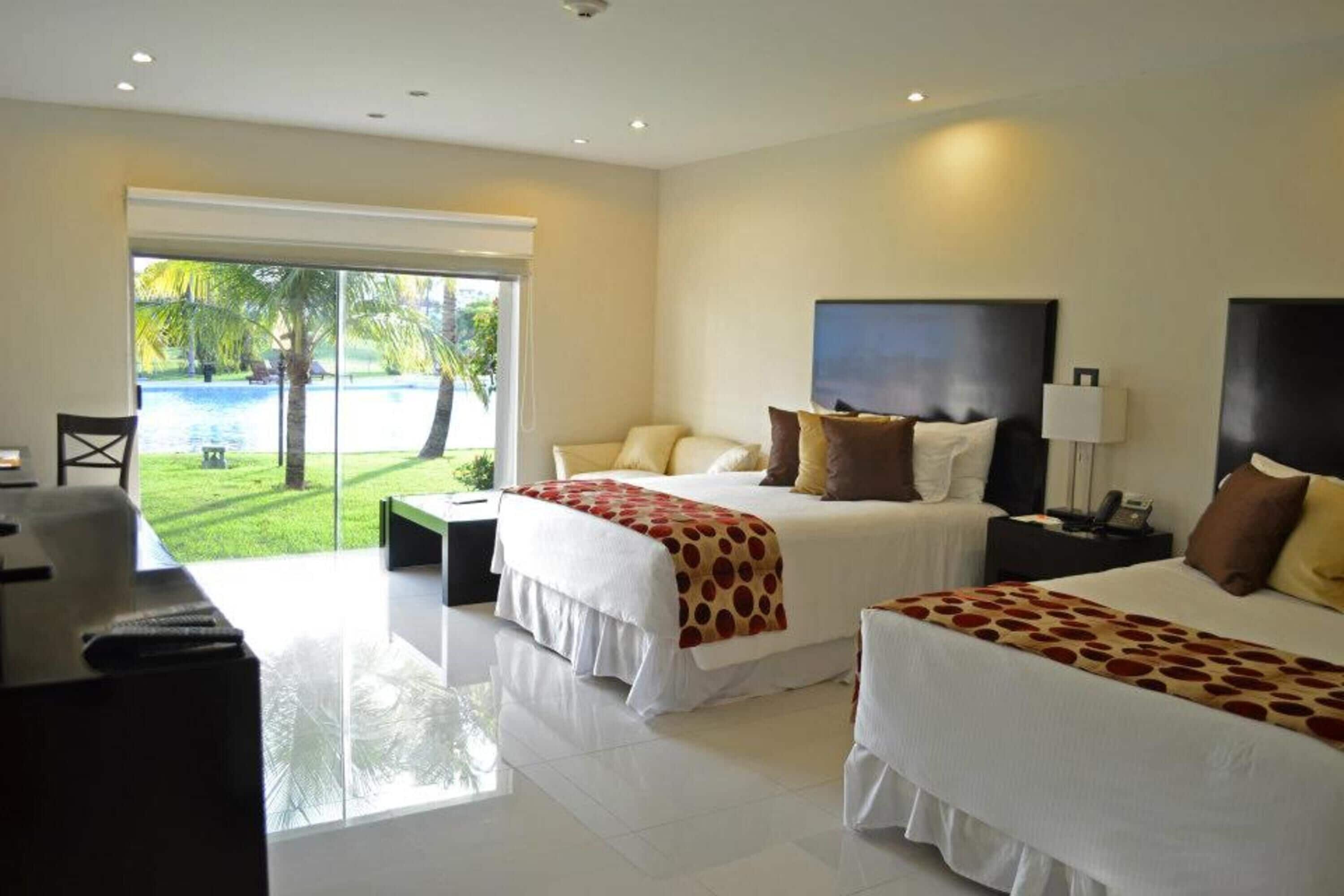 Suite Premium, 2 camas Queen size, vista a la alberca | Vista desde la habitación