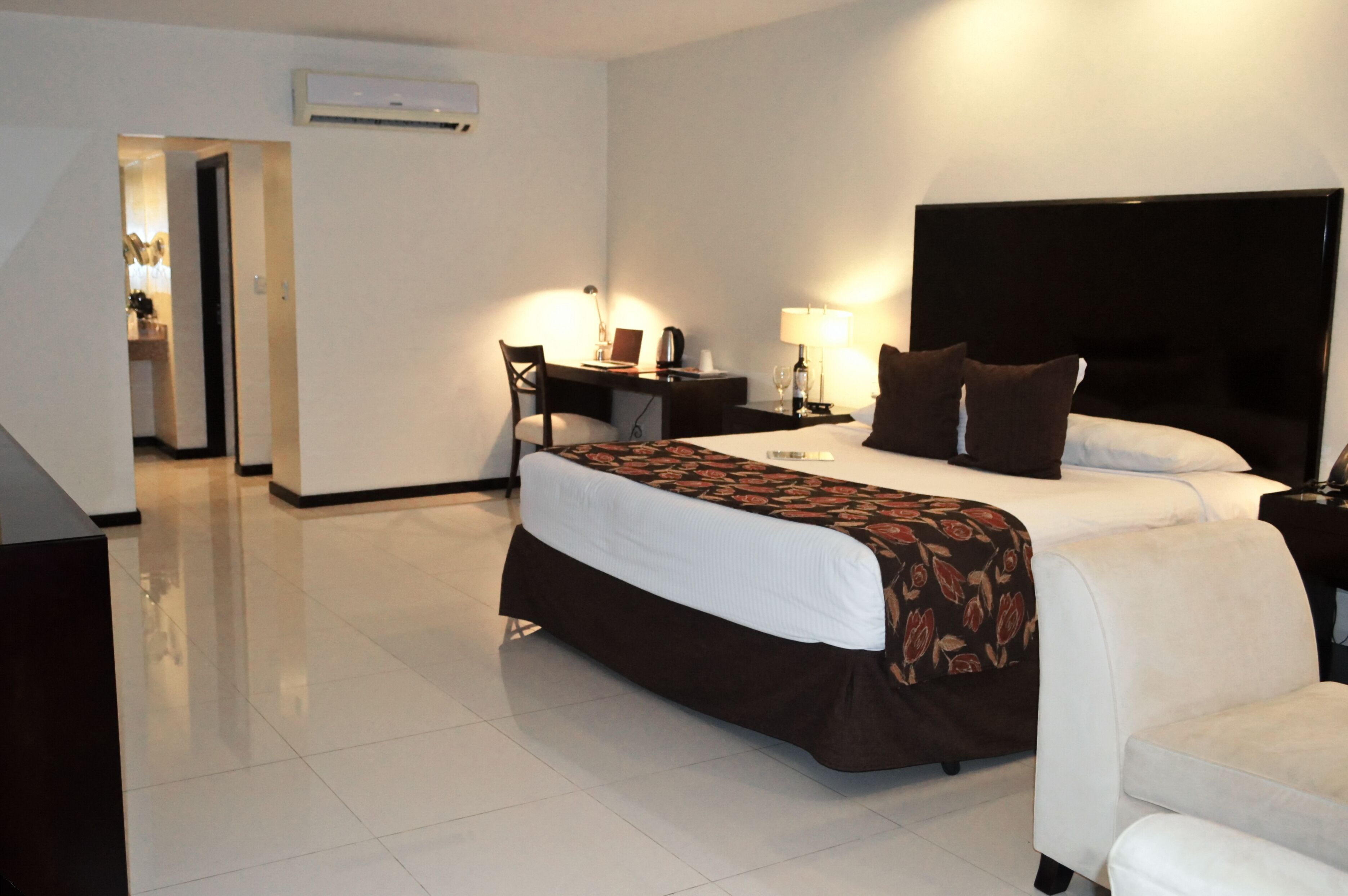 premium double room, 1 king bed, pool view | 1 bedroom, minibar, in-room safe, desk