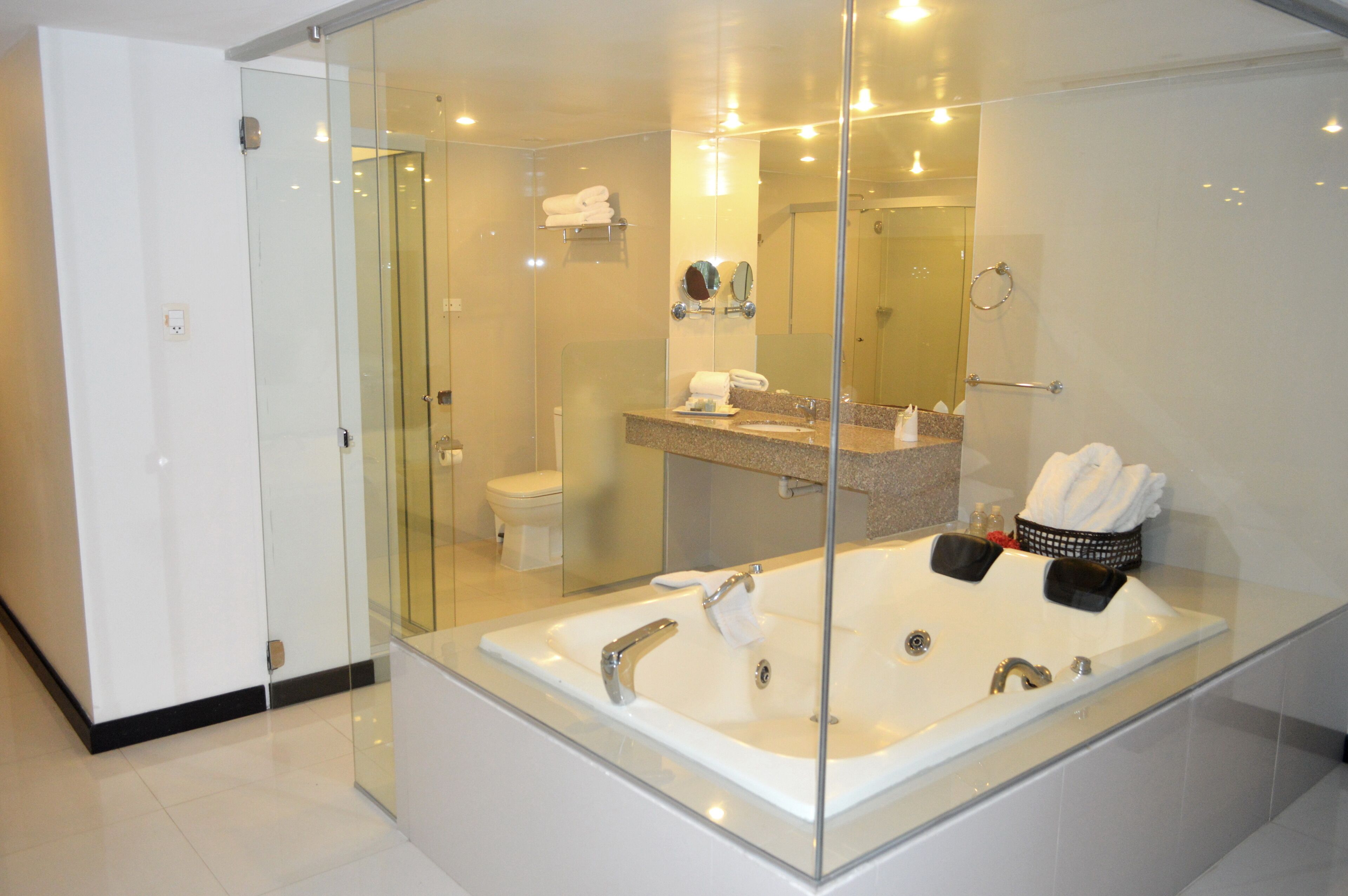 luxury suite, 1 king bed, pool view | bathroom | shower, rainfall showerhead, designer toiletries, hair dryer