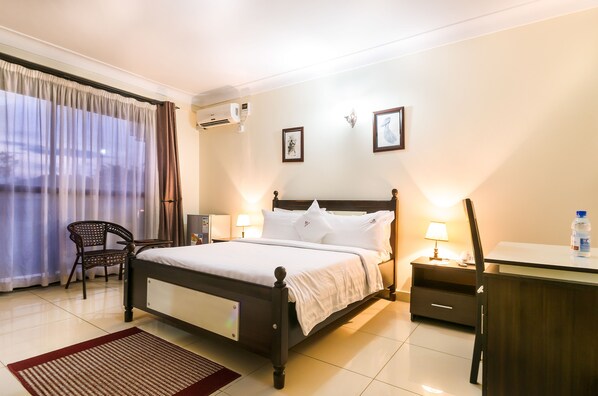Deluxe Double Room, City View | Premium bedding, in-room safe, desk, laptop workspace
