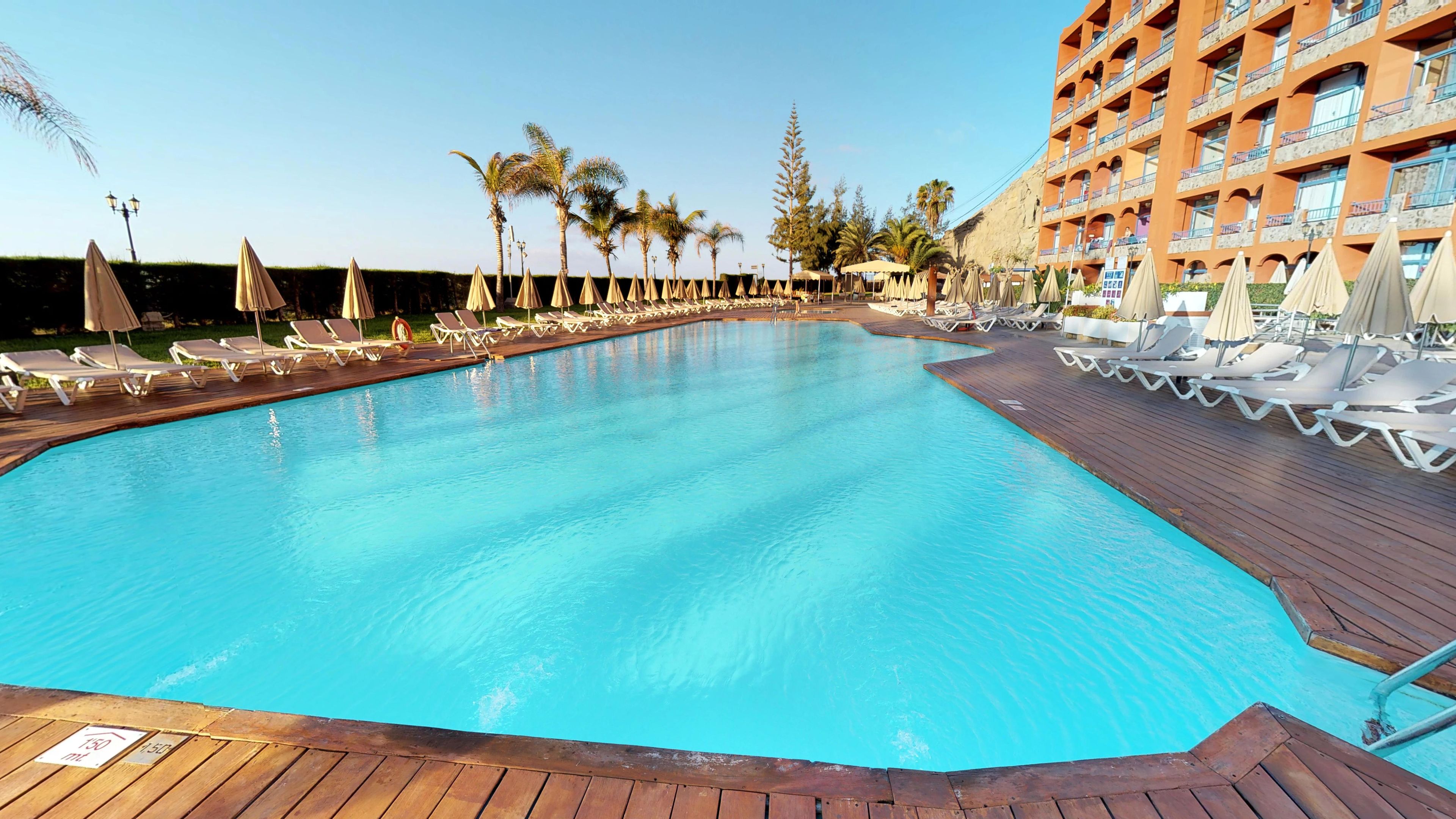 outdoor pool, pool loungers