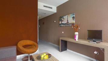 32-inch flat-screen TV with satellite channels, TV