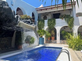 Outdoor pool, open 7 AM to 9 PM, sun loungers