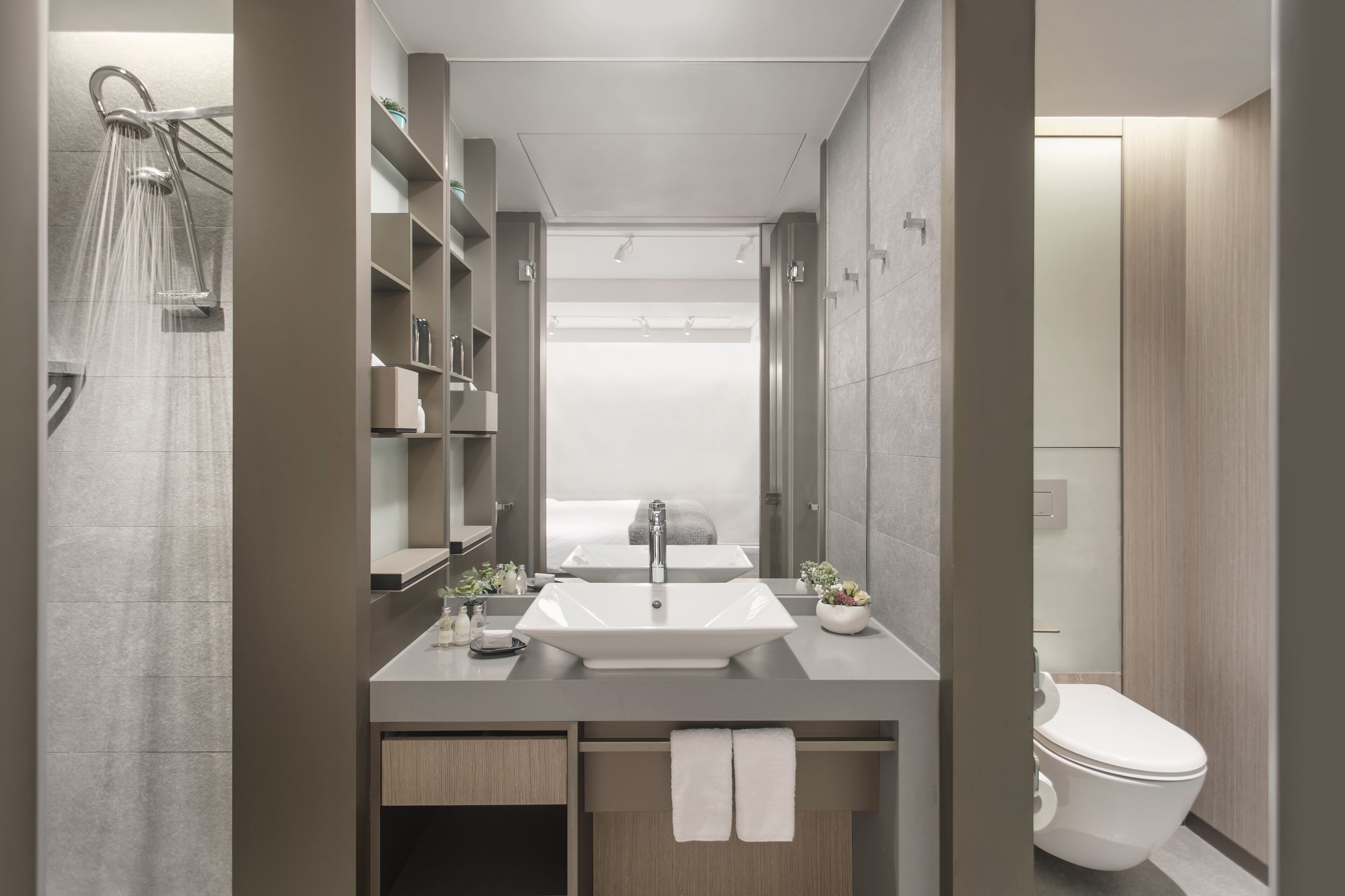 premium business king room | bathroom | free toiletries, hair dryer, slippers, towels