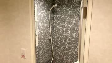 Hair dryer, slippers, towels, shampoo