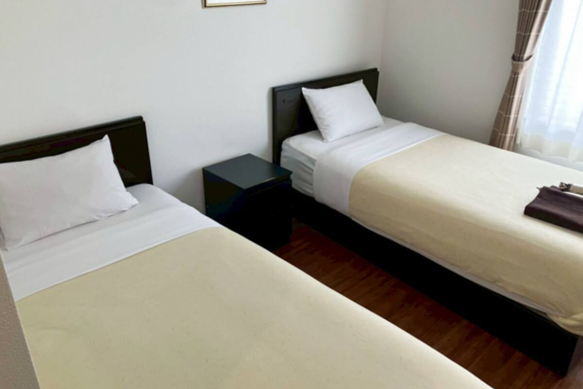 Quarto duplo, para não fumantes (with Shower) | Wi-Fi de cortesia, roupa de cama