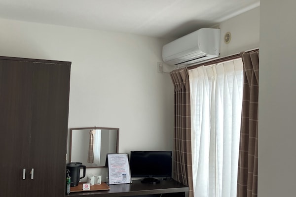 Twin Room, Non Smoking, Private Bathroom | WiFi (free), bed sheets