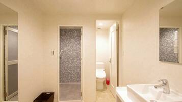 Hair dryer, slippers, towels, shampoo