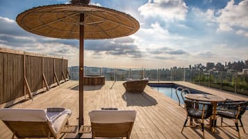 Outdoor pool, pool umbrellas, pool loungers