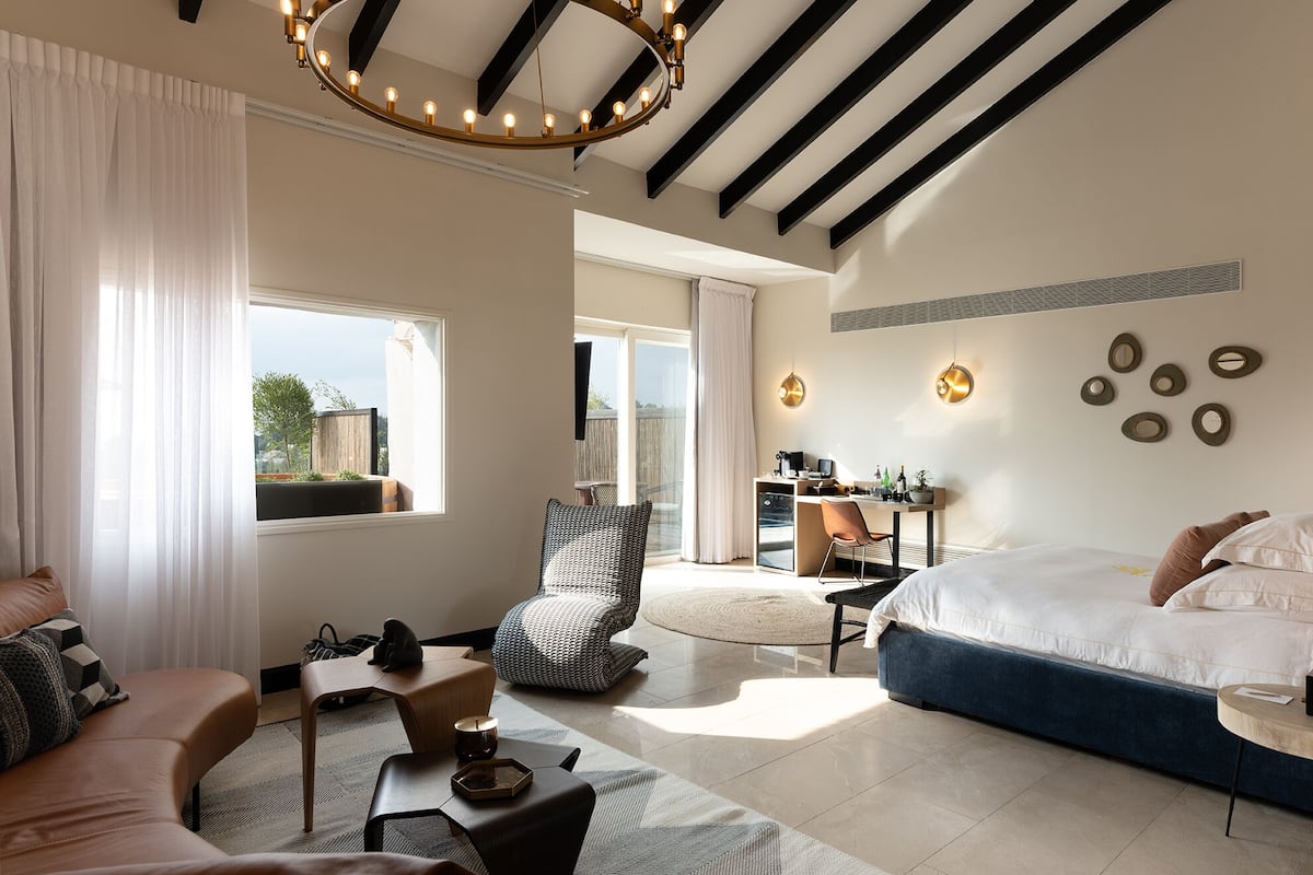 Exclusive Suite with Private Pool and Sauna | Living area | TV