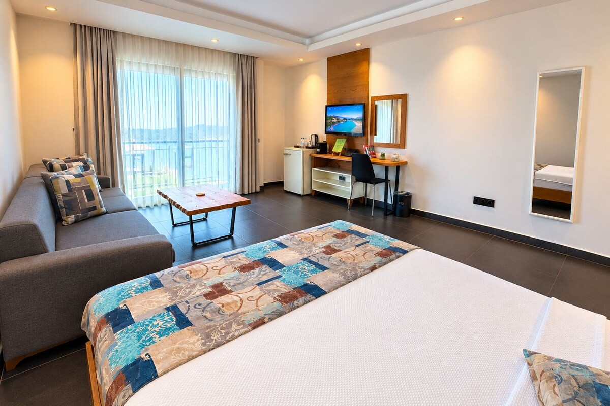 Deluxe-Zimmer, Meerblick | Hochwertige Bettwaren, Zimmersafe, Schreibtisch