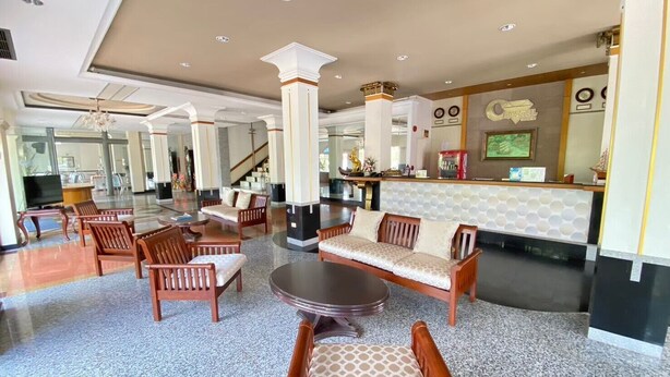 A spacious lobby with a reception desk, seating area, and a staircase. - Crystal Hotel Krabi (Krabi)