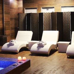 Indoor pool, open noon to 9:00 PM, free pool cabanas, pool loungers