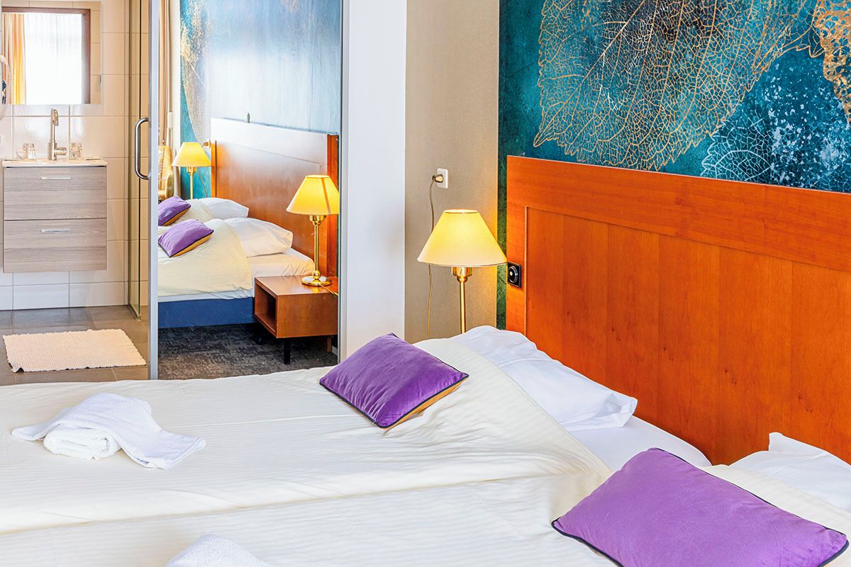 Standaard Twin kamer | Een kluis op de kamer, een bureau, gratis wifi