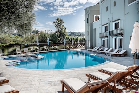 2 outdoor pools, pool umbrellas, pool loungers. Casa Maria Hotel Apartments