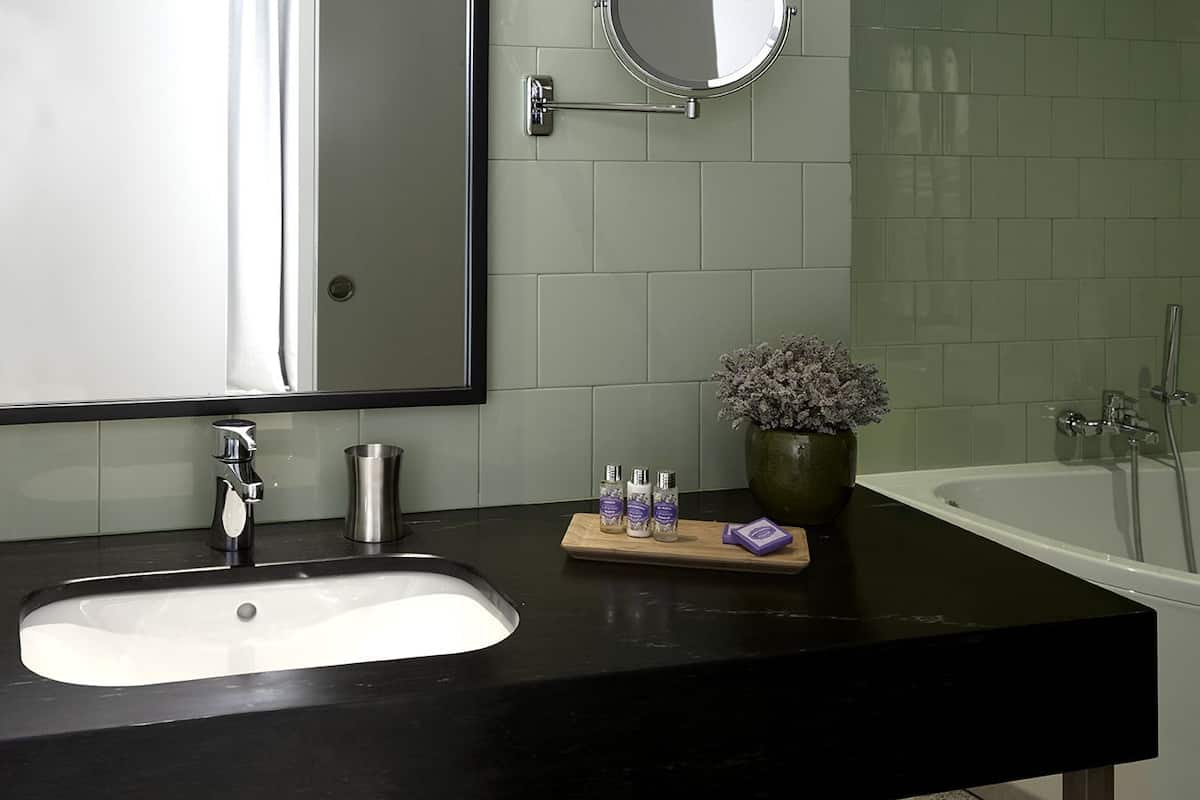 romantic suite | bathroom | hair dryer, bathrobes, towels