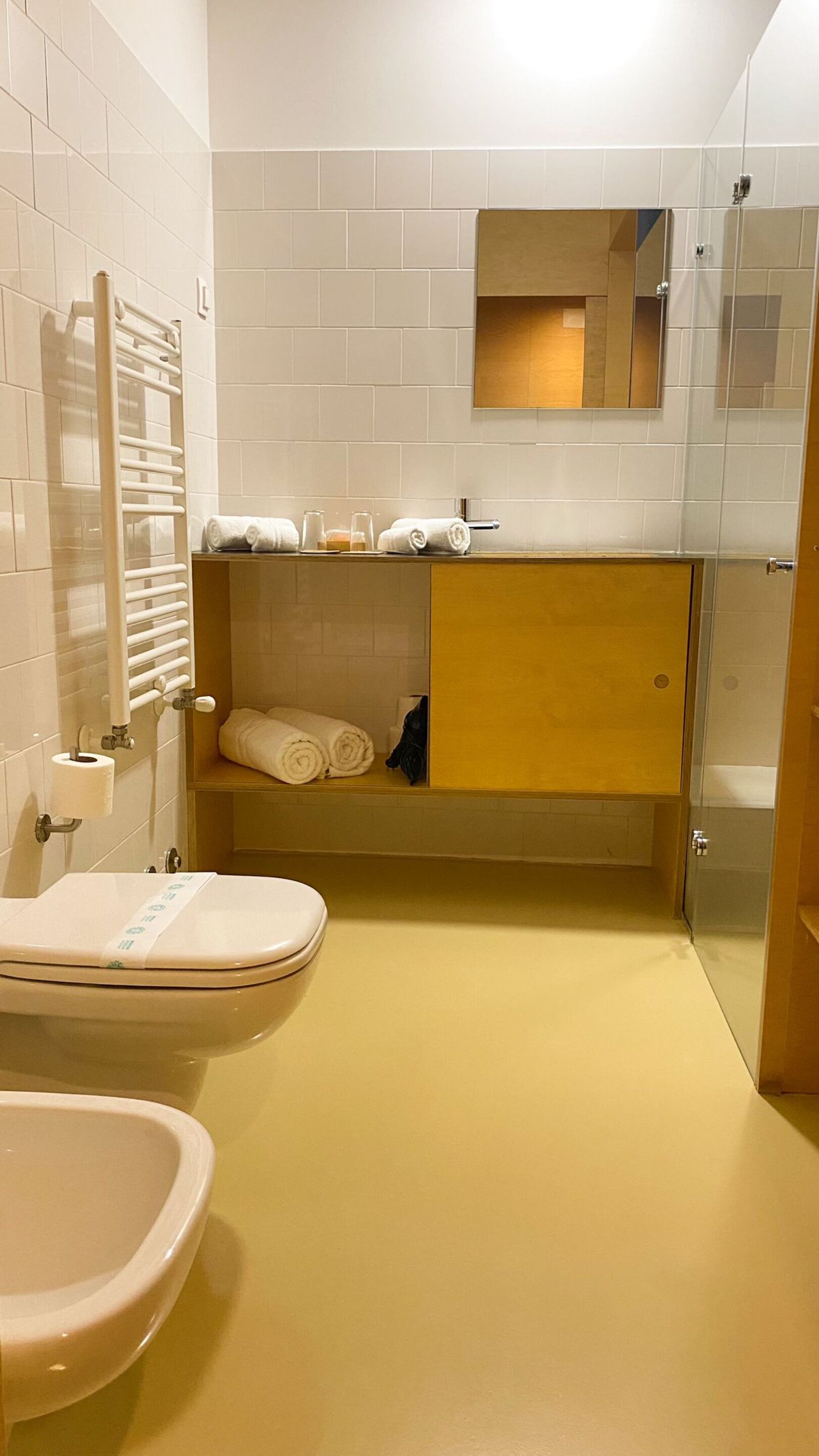 superior twin room | bathroom | shower, hair dryer, bidet, towels