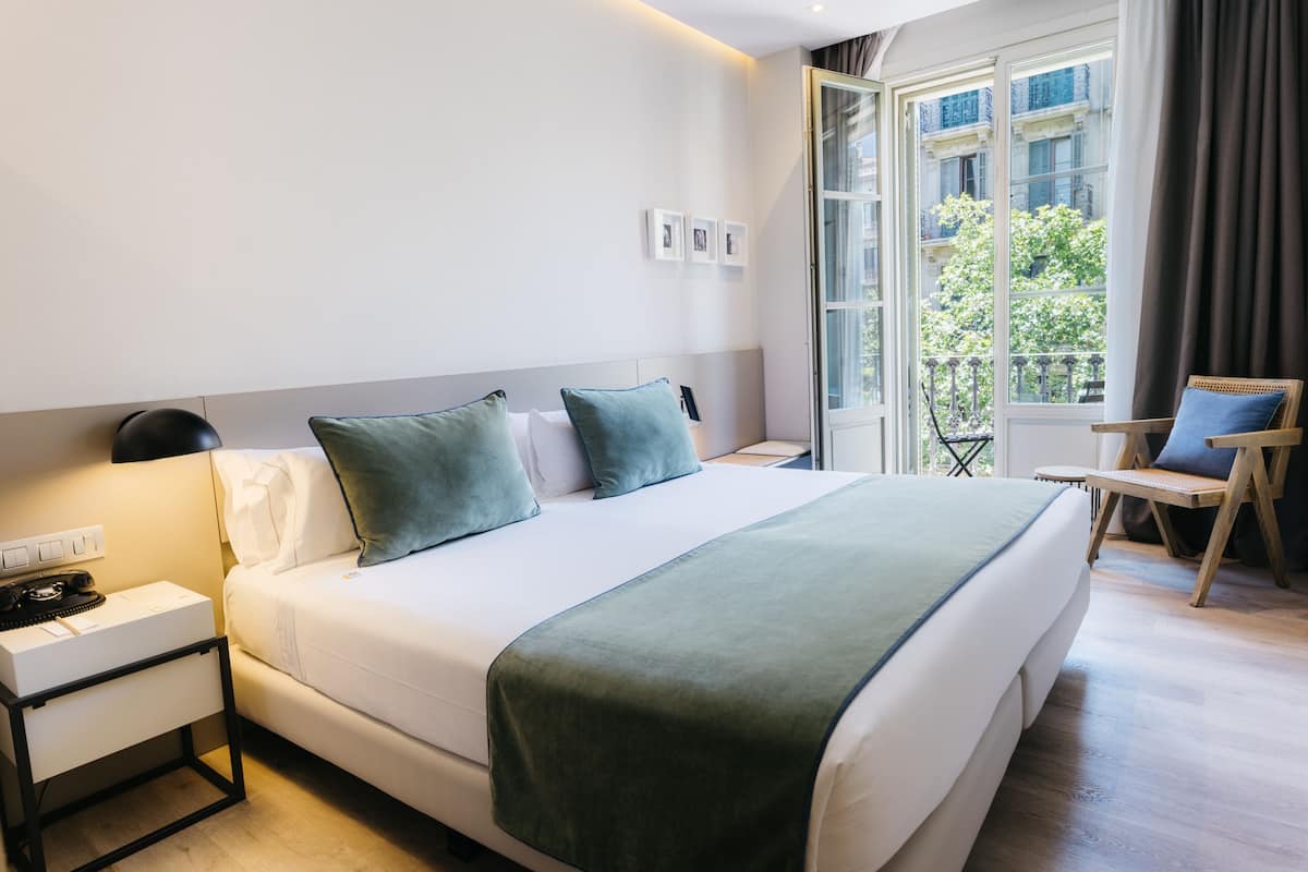Deluxe Double Room, Exterior, Street view | Minibar, in-room safe, desk, blackout curtains