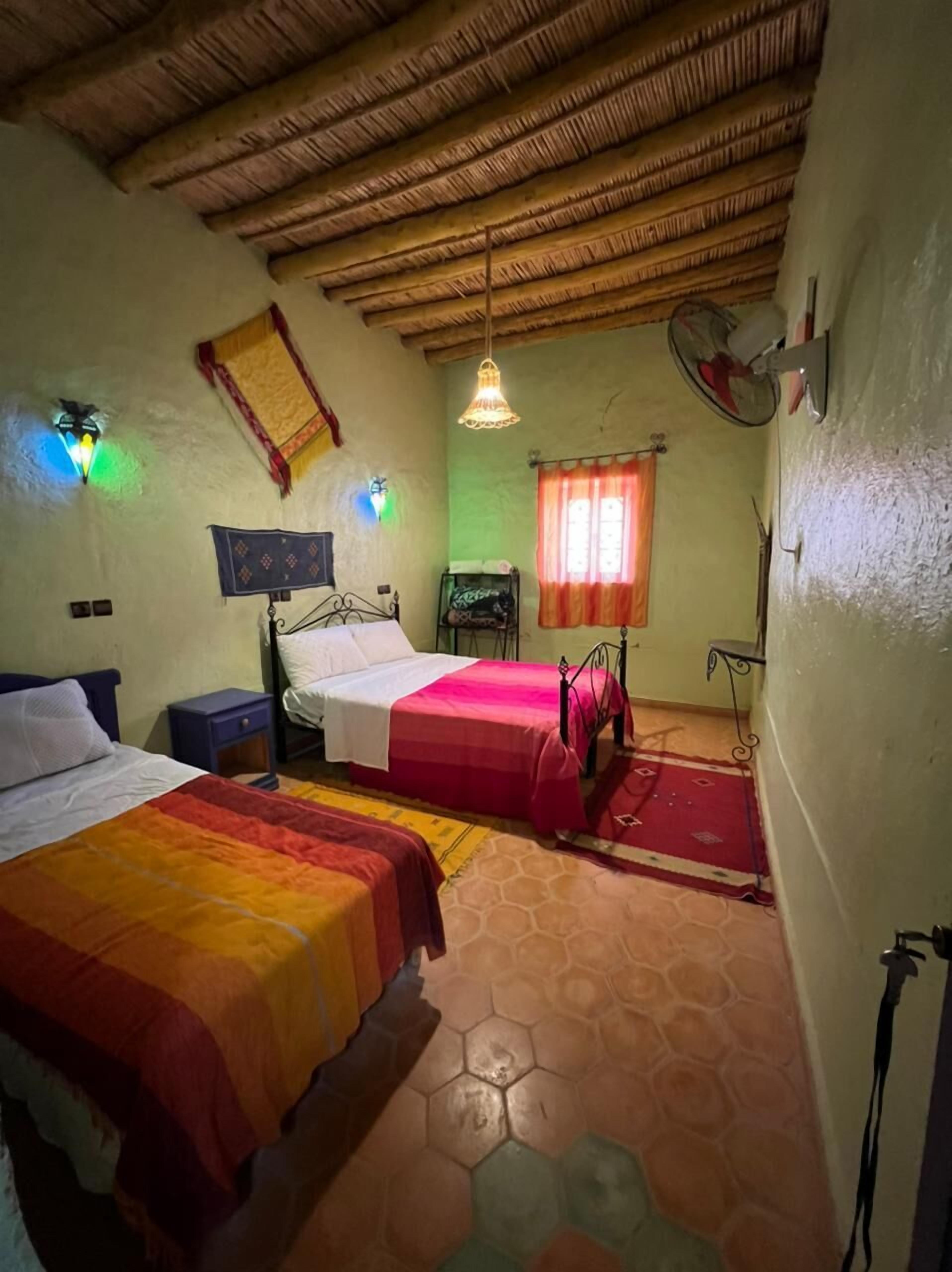 standard triple room, shared bathroom | in-room safe, cots/infant beds