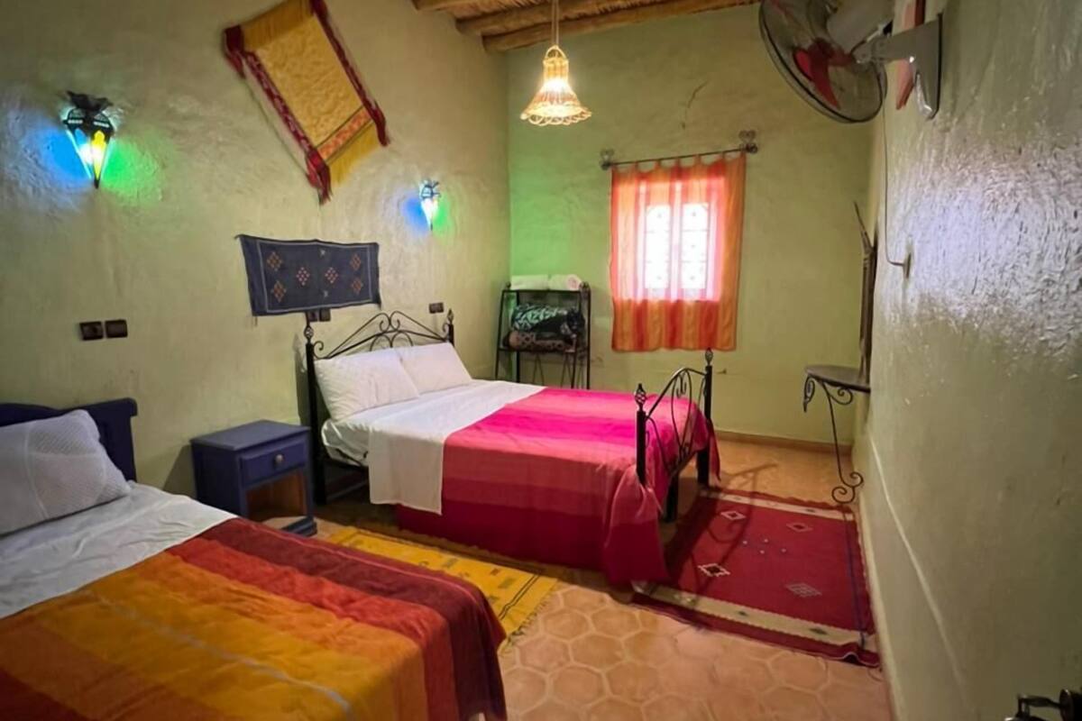 standard triple room, shared bathroom | in-room safe, cots/infant beds