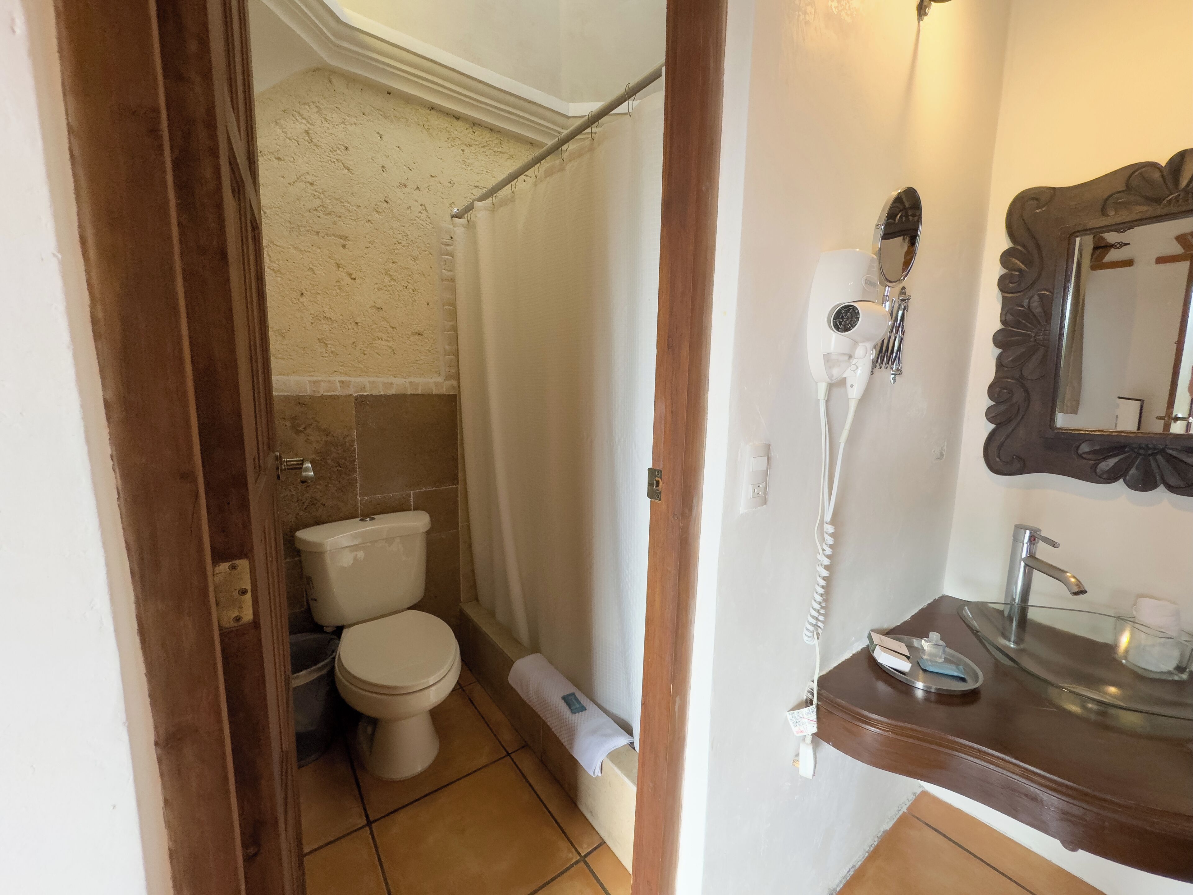 standard quadruple room | bathroom | shower, towels, soap, shampoo