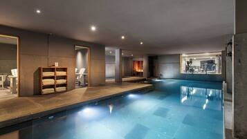 Indoor pool, seasonal outdoor pool, pool umbrellas, pool loungers