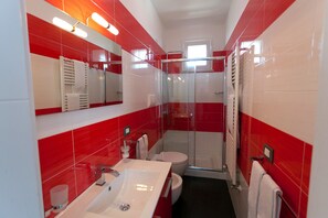 Double Room | Bathroom | Shower, hair dryer, bathrobes, bidet