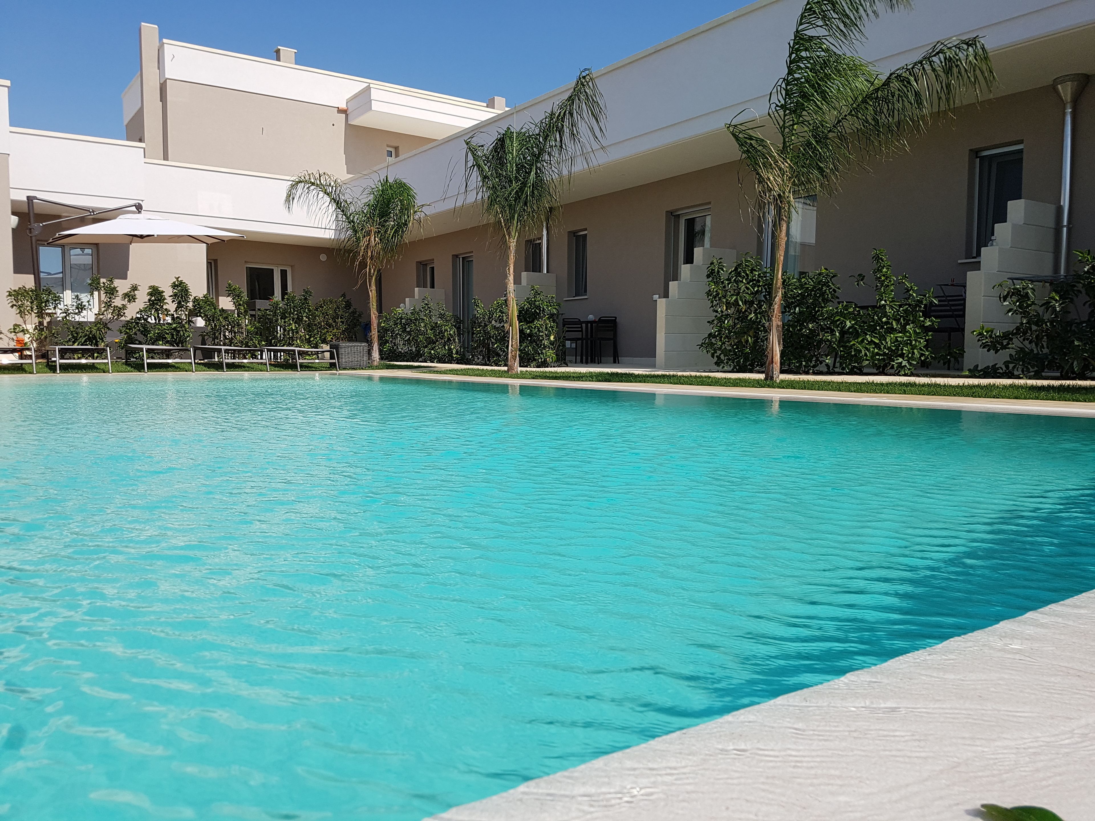 Deluxe Room, 1 Bedroom, Non Smoking, Pool View | Outdoor pool | Outdoor pool, sun loungers