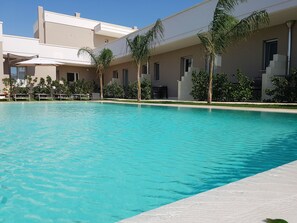 Deluxe Room, 1 Bedroom, Non Smoking, Pool View | Outdoor pool | Outdoor pool, sun loungers