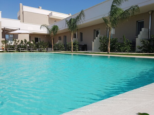 Deluxe Room, 1 Bedroom, Non Smoking, Pool View | Outdoor pool